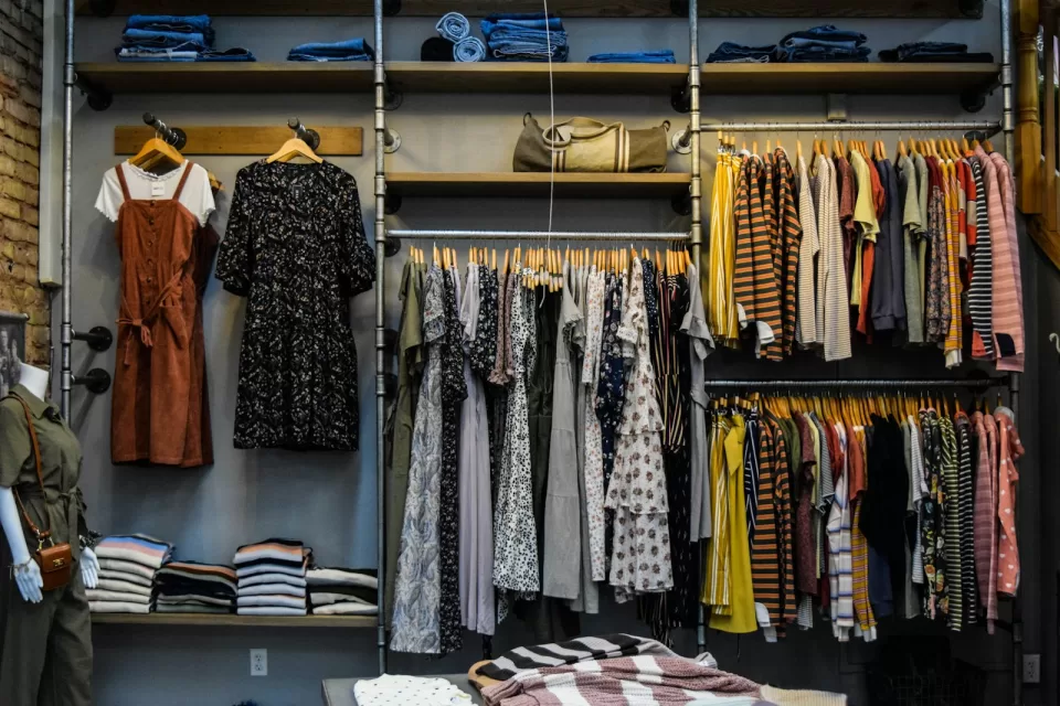 Rail of clothes on hangers in a fashion shop