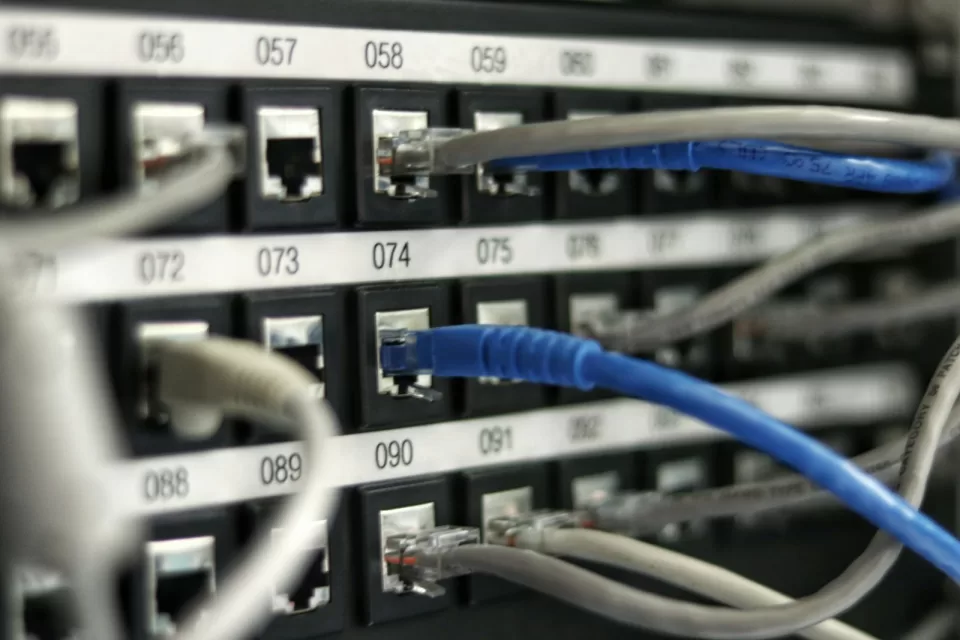 Network switch with cables plugged into its ports