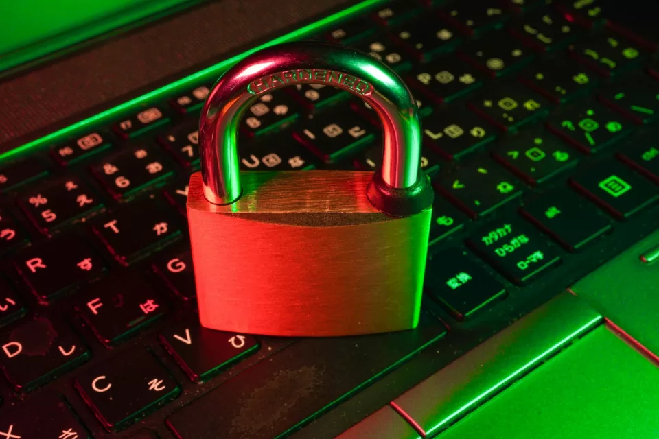 Padlock resting on a laptop keyboard