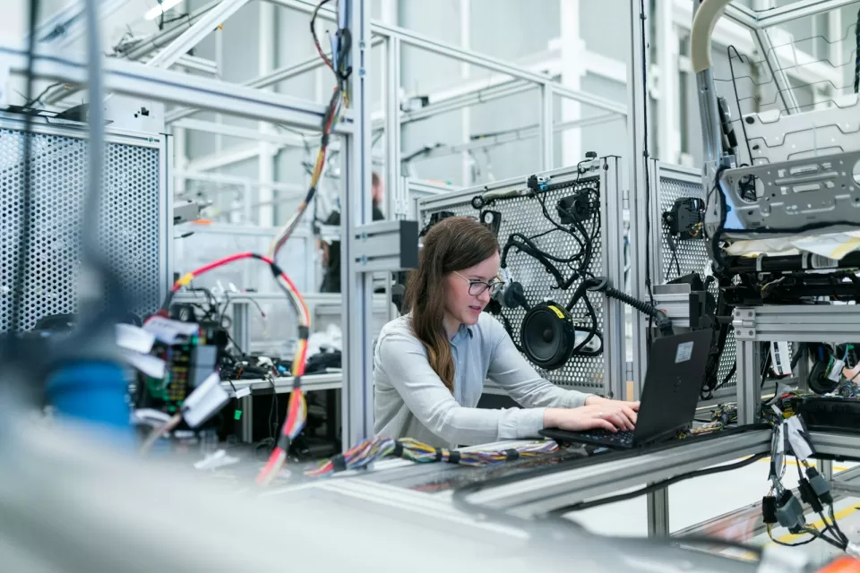 Engineer working with equipment at a laboratory bench
