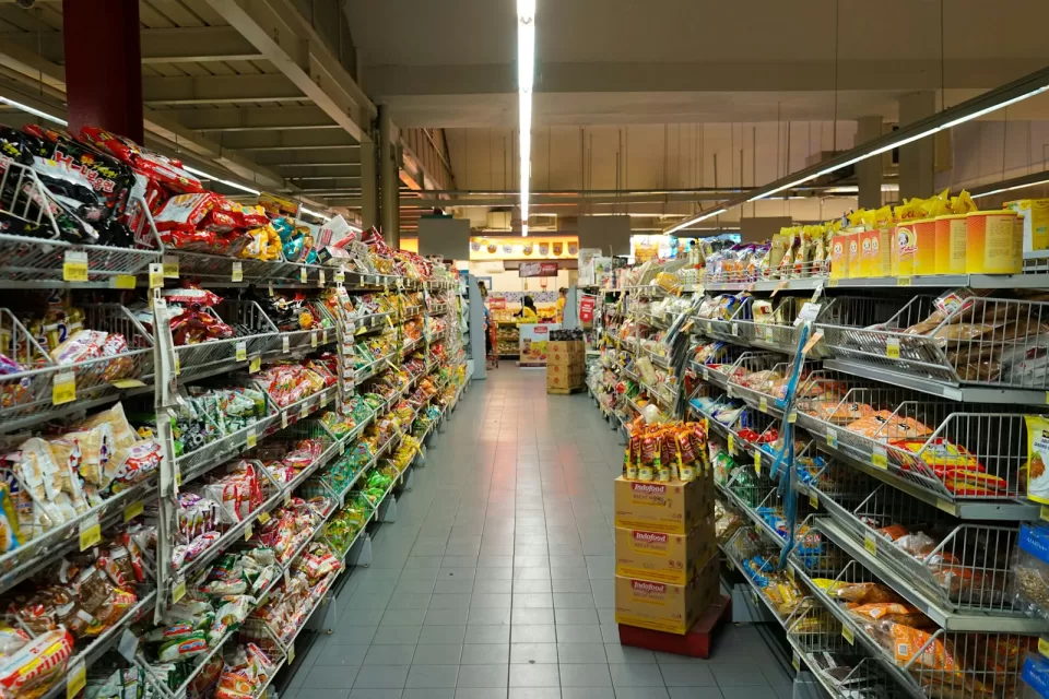 Neatly stocked shelves in a shop aisle