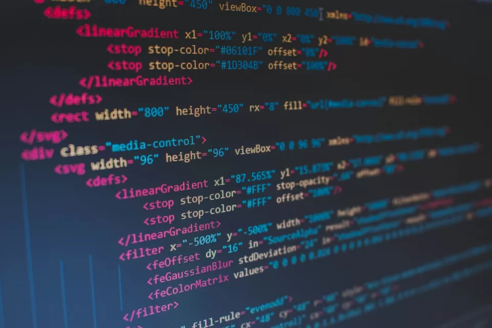 HTML and SVG code in a colourful editor on a dark background