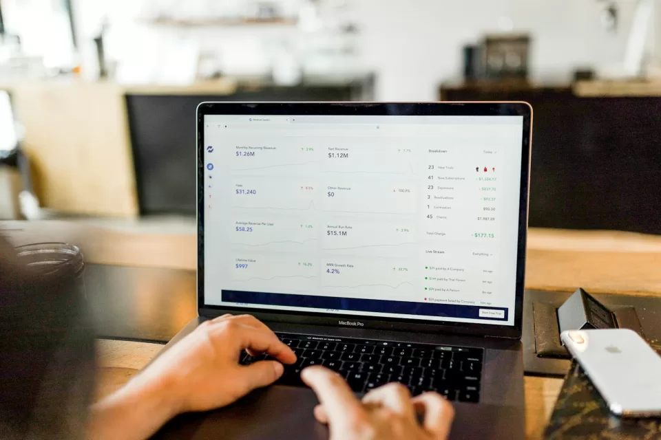Laptop on a desk showing an online store dashboard