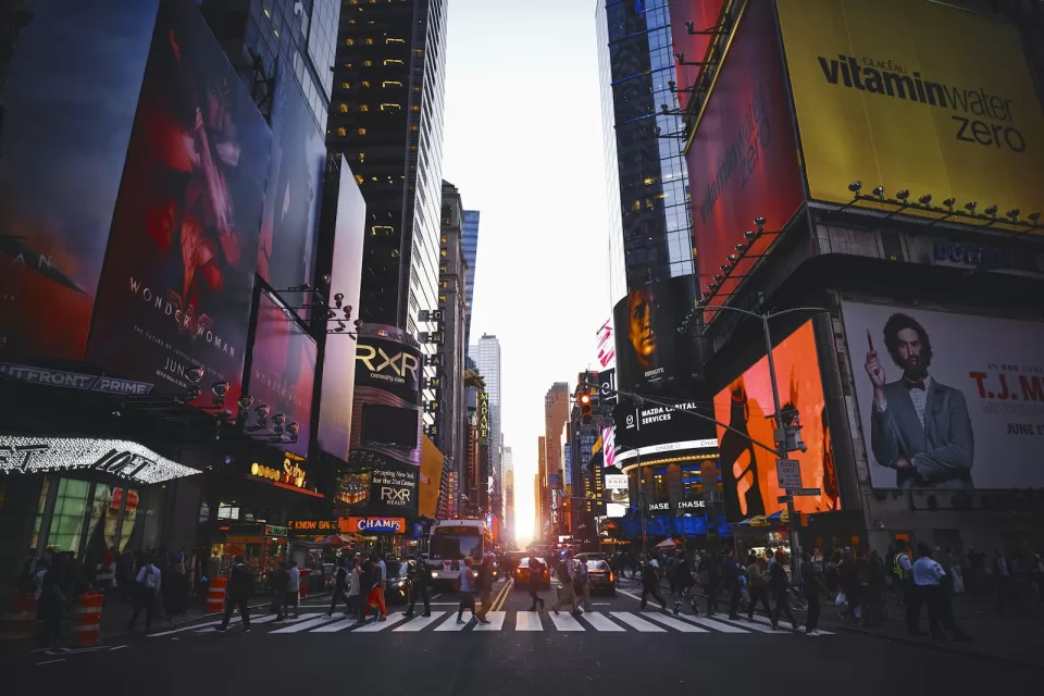 Times Square in New York with bright billboards and busy streets