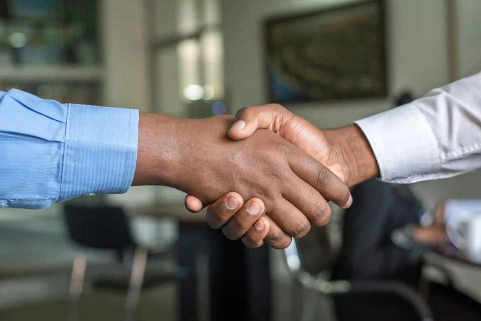 Handshake agreeing a new engagement