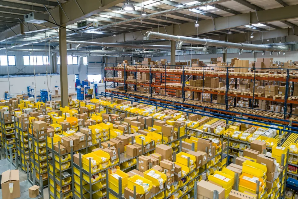 Warehouse shelves stocked with parcels