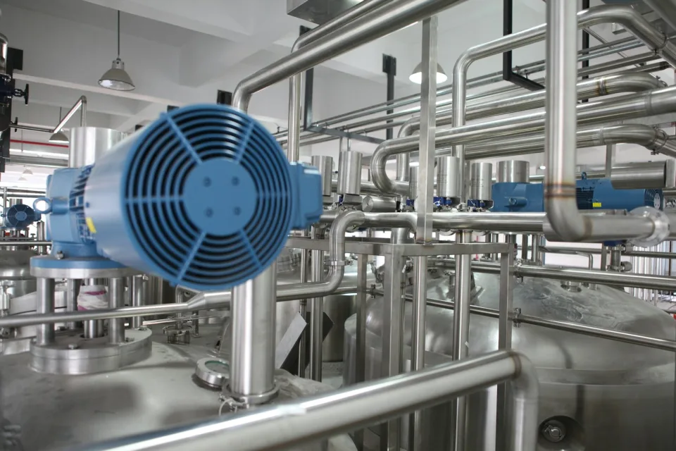 Pipes and pumps inside a processing plant